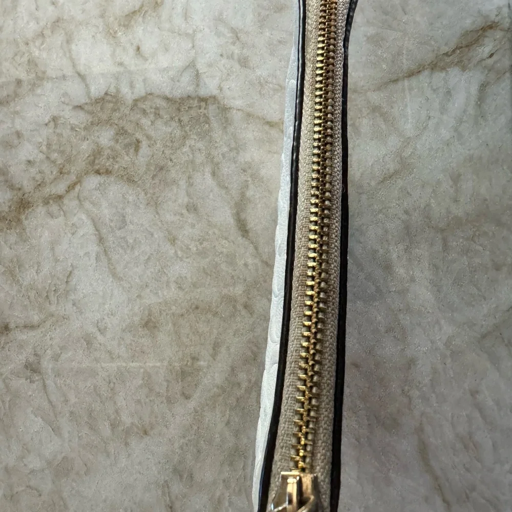 Authentic Coach signature embossed Chalk Wristlet